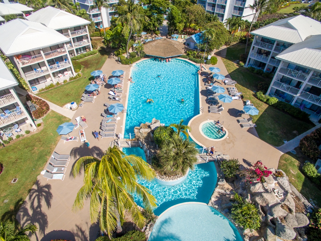 The official site for the Sunset Cove Condominiums on Seven Mile Beach ... - High-End Condominiums With Private Saltwater Pools